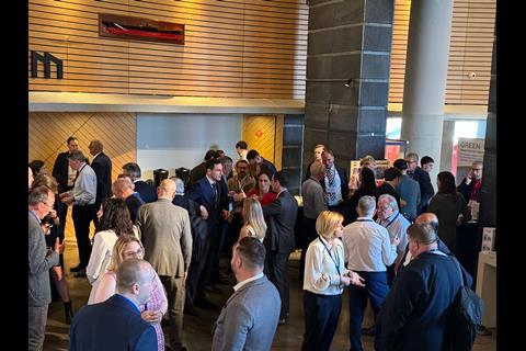 Coastlink delegates networking in the atrium area of the Maritime Museum, Bilbao between conference sessions